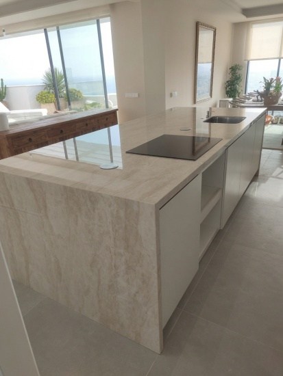 Dekton Arga kitchen island with 4cm thick built-up mitred edges installed in Benalmadena