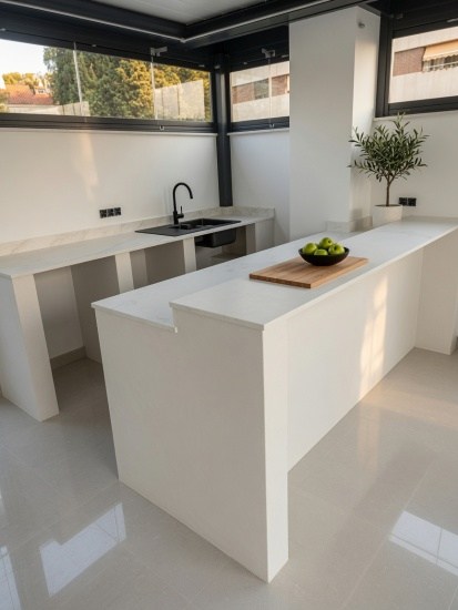 Dekton Rem white worktops installed on a terrace kitchen in El Limonar Málaga by Encimeras Málaga