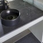 Encimera con fregadero en el baño Dekton Fossil