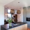 Isla de cocina con fregadero en el centro Silestone Arden Blue suede
