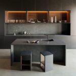 a black kitchen with Dekton Micron worktops and splashbacks