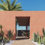 Fachada de entrada de exterior revestida con pared porcelánico Dekton Umber