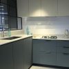 cocina blanca con Laminam Blanco Mijas