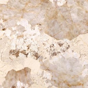 Textura detallada de superficie sinterizada Arklam Patagonia Gold con patrones dorados para encimeras en Málaga.