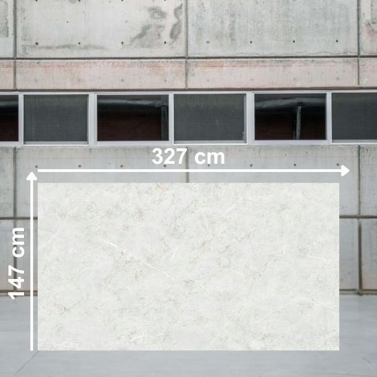 Losa grande de Dekton Evok de 327 cm x 147 cm en almacén, con textura gris ceniza uniforme.