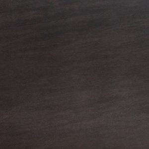 Textura close-up de encimera Neolith Basalt Black Málaga, acabado mate negro con detalles sutiles.