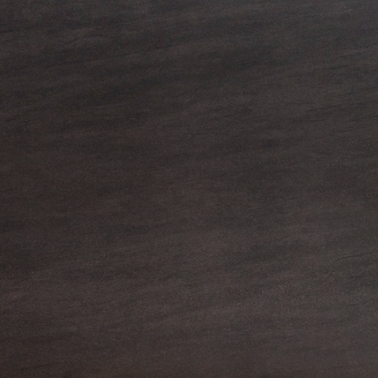 Textura close-up de encimera Neolith Basalt Black Málaga, acabado mate negro con detalles sutiles.