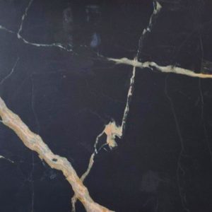 Textura detallada de Blaker Total Cosmic Black negra con vetas doradas en patrón marmóreo intenso