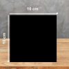 Muestra 10x10 cm de Blaker Negro Sólido negra uniforme sobre fondo gris.