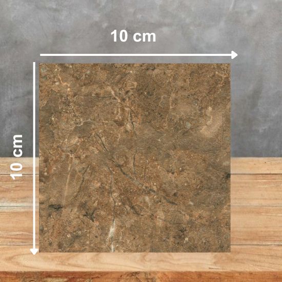 Muestra 10x10 cm de Mármol Marrón Alhambra marrón con vetas sutiles sobre fondo gris.