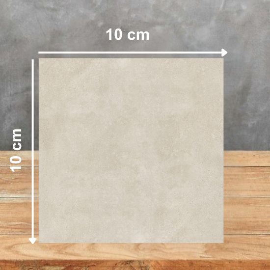 Muestra 10x10 cm de Venux Bellissima Beige beige con vetas beiges sobre fondo gris.