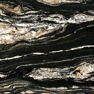 extura detallada del Granito Black Taurus, granito negro con vetas doradas y blancas en primer plano
