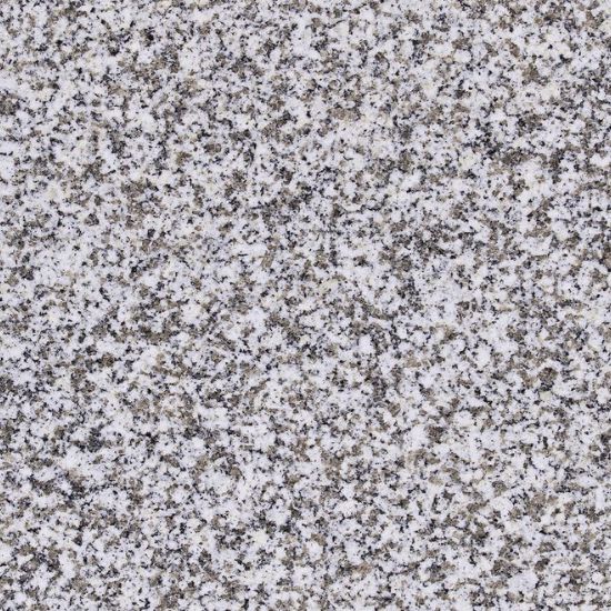 Textura detallada del Granito Blanquino, granito blanco con motas negras y grises