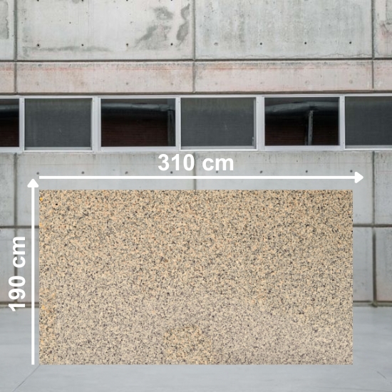 osa jumbo de Granito Crema Camelia de 310 x 190 cm en tonos crema y beige con motas negras