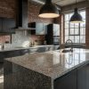 ocina industrial con isla y encimera en Granito Crema Julia, ladrillo visto y muebles oscuros