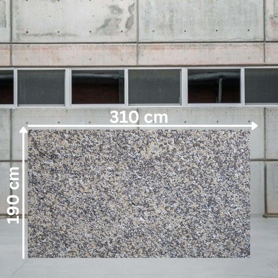 osa jumbo de Granito Mondariz de 310 x 190 cm en crema con motas negras y grises