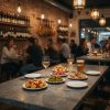 Mesa de restaurante en Pizarra Celeste con tapas y ambiente acogedor