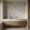Mueble de baño con encimera cuarcita Cristallo traslúcida y grifería dorada