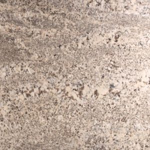 Granito White Evolution detalle textura beige con motas grises y negras