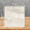 Muestra 10 x 10 cm de porcelánico Techlam Delta con vetas grises y efecto fragmentos