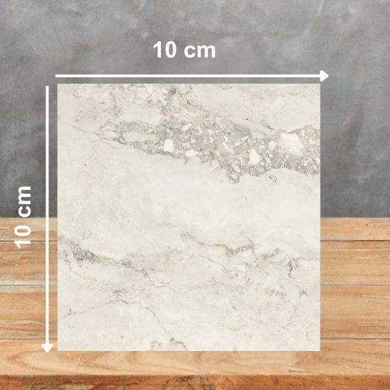 Muestra 10 x 10 cm de porcelánico Techlam Delta con vetas grises y efecto fragmentos