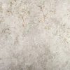 Cuarcita Terra Polaris detalle textura blanca con vetas doradas y oxido