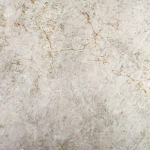 Cuarcita Terra Polaris detalle textura blanca con vetas doradas y oxido