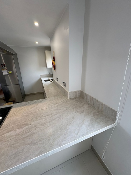 Laminam Taj Mahal porcelain kitchen countertops installed in a modern kitchen in Estepona