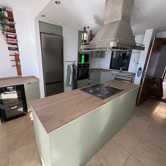 Wood-effect porcelain kitchen countertops installed in a modern kitchen in Fuengirola