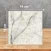 Muestra Ascale Aura Lux White 10x10 cm con vetas ocres