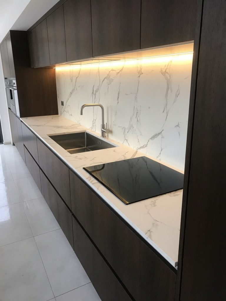 kton Aura white marble-effect worktops installed in a Marbella kitchen