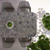 Mesa de exterior con encimera Dekton Ceppo y sillas de diseño