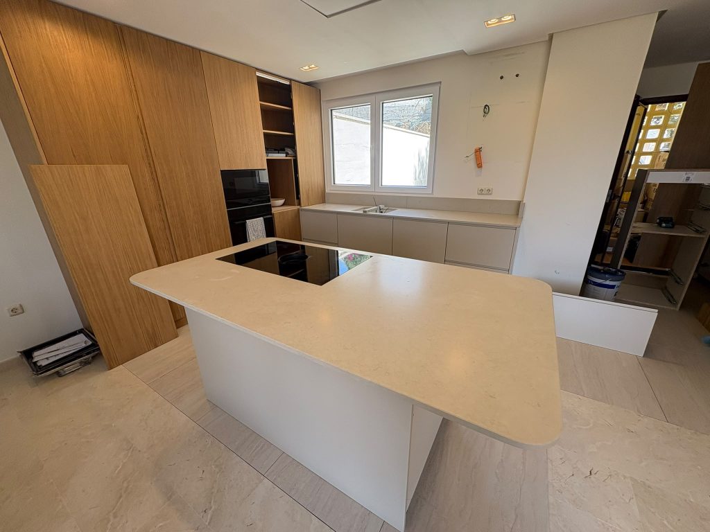 Equs Dune beige quartz kitchen island installation in Marbella
